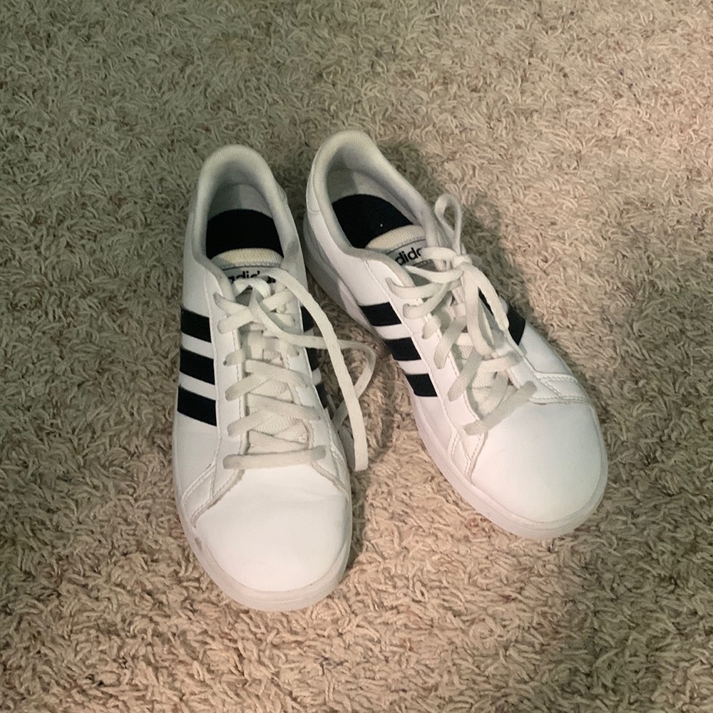Black and white Adidas sneakers